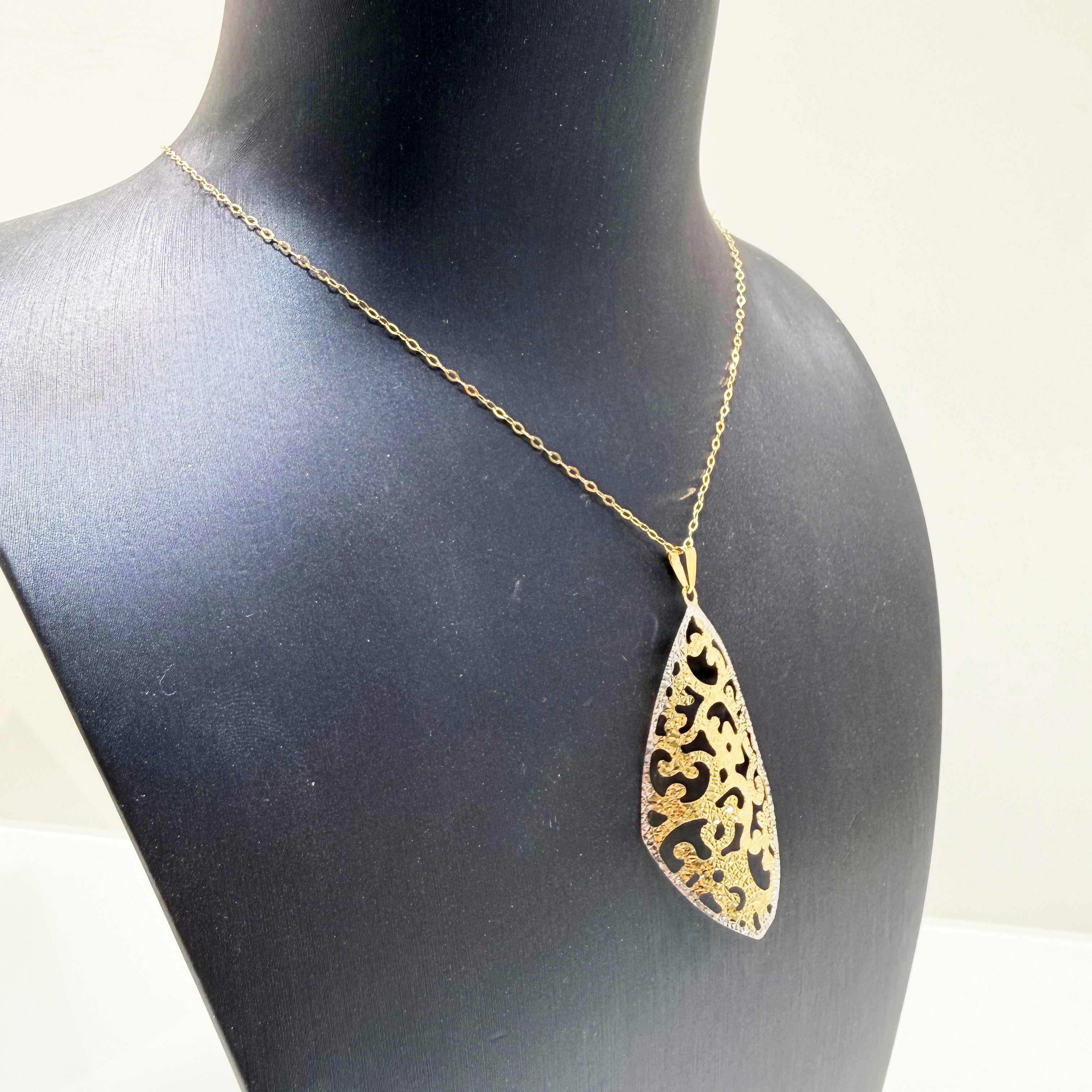Ciondolo traforato fantasia in oro giallo e bianco 18KT (750) – Made in Italy