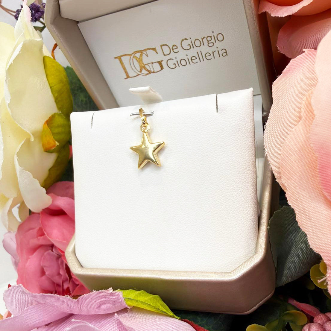 Ciondolo stella da donna in oro giallo 18 Kt (750)
