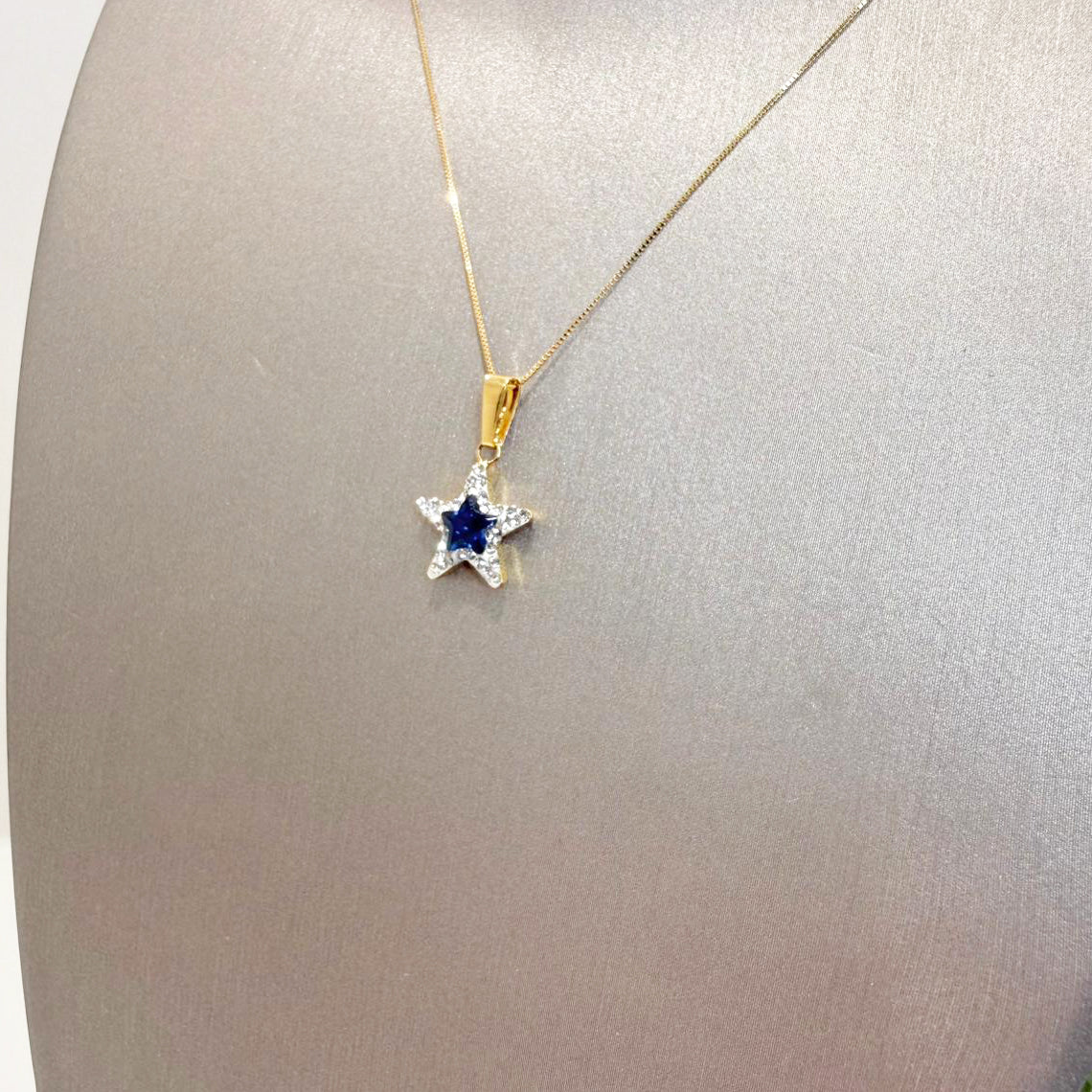Ciondolo stella da donna con pietra blu e zirconi in oro giallo 18 Kt (750)