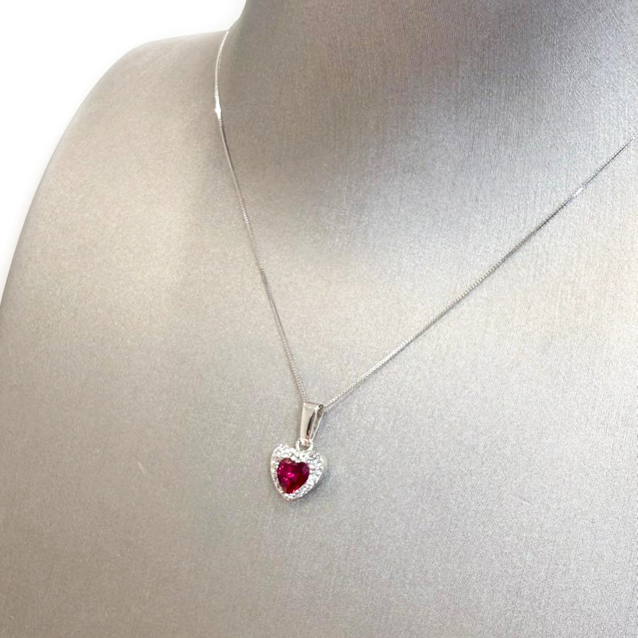 Ciondolo cuore da donna con pietra rossa e zirconi in oro bianco 18 Kt (750)