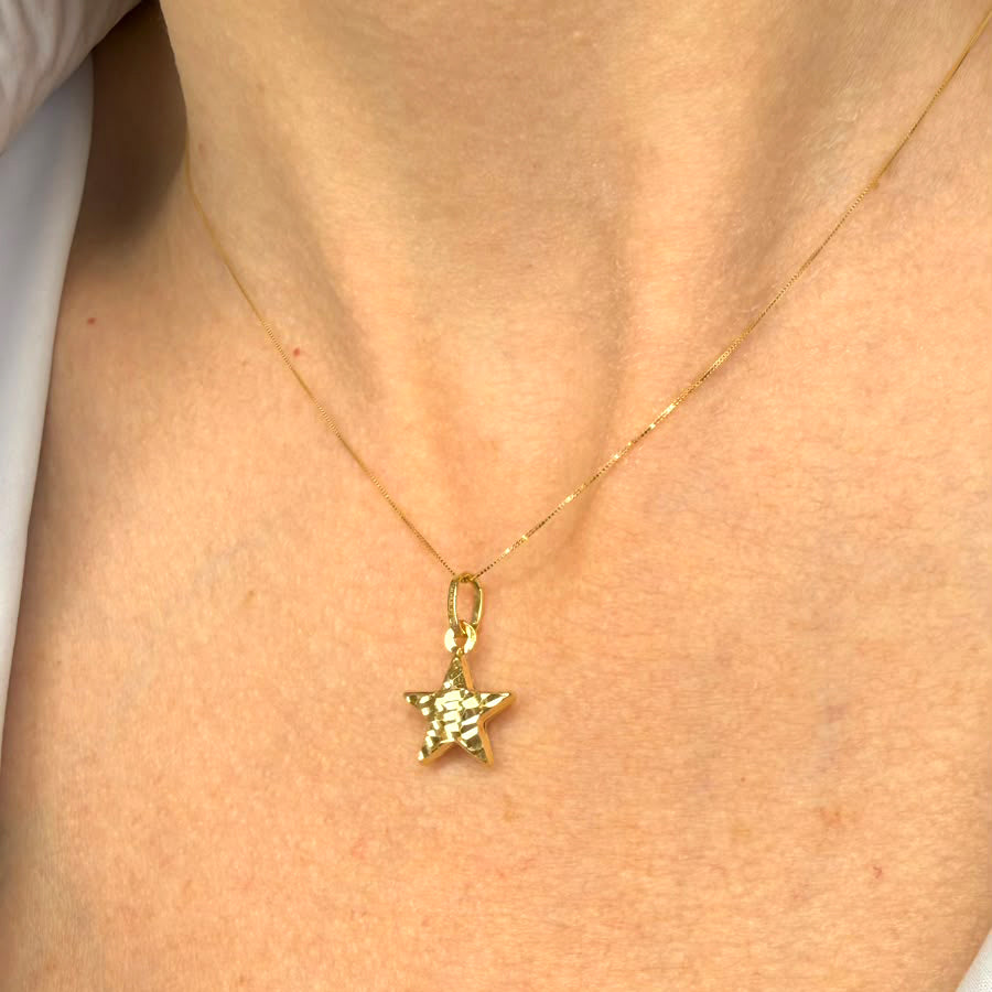 Collana con stella sfaccettata in oro giallo 18 KT (750)