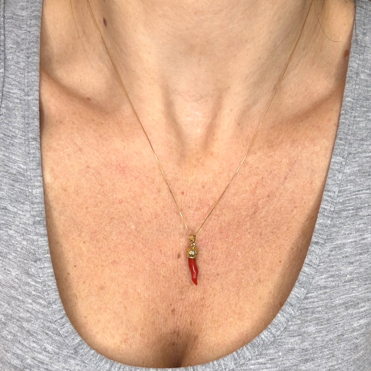 COLLANA CON CORNETTO ROSSO IN ORO GIALLO 18 KT (750)