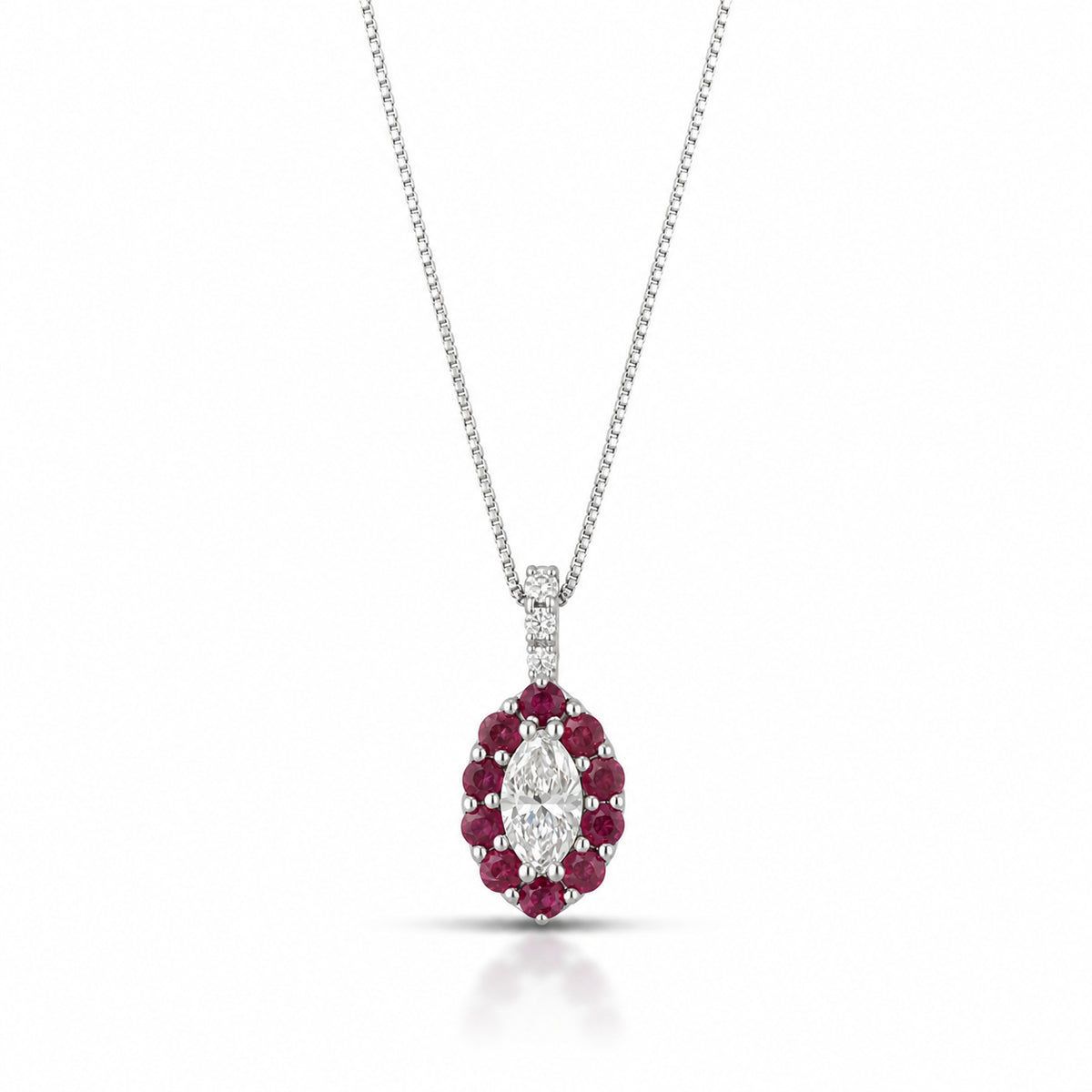 COLLANA CON CUORE IN ORO ROSA 18KT CON DIAMANTE E RUBINI