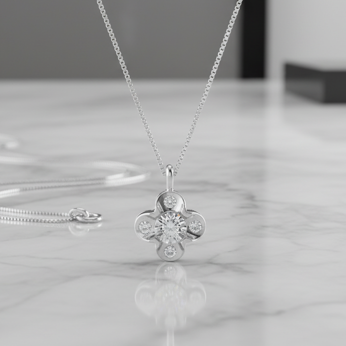 COLLANA CON FIORE IN ORO BIANCO 18 CARATI CON DIAMANTI