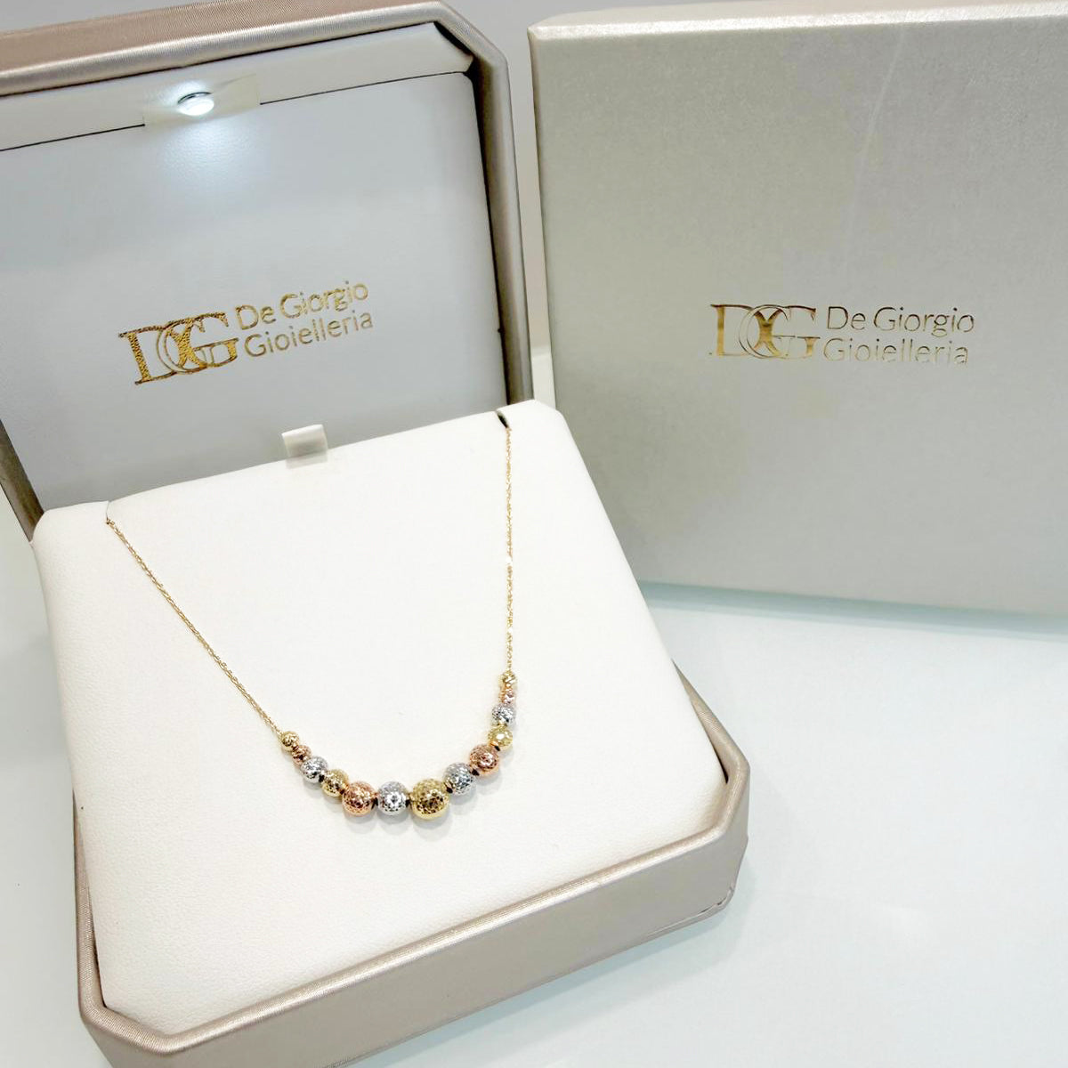 Collana con sfere diamantate in oro giallo, bianco e rosa 18KT (750)