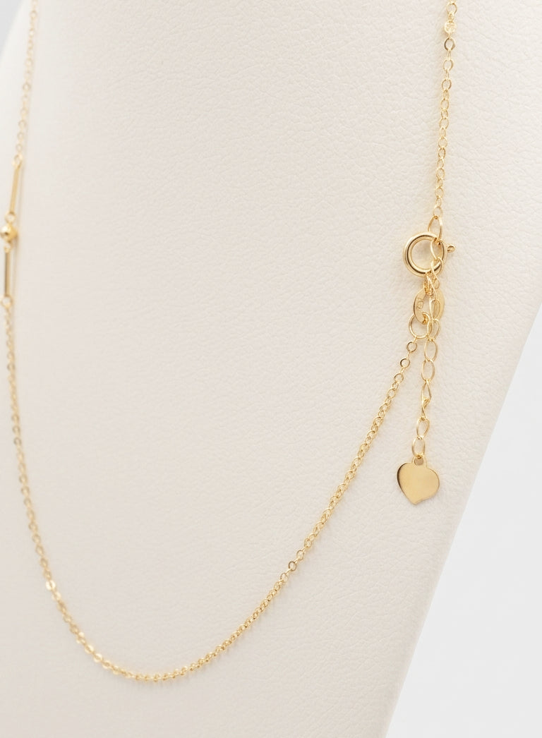 Collana con cuore e maglie geometriche in oro giallo 18 KT (750)