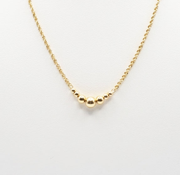 Collana con sfere centrali in oro giallo 18 KT (750)