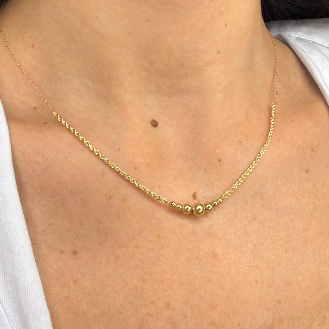 Collana con sfere centrali in oro giallo 18 KT (750)