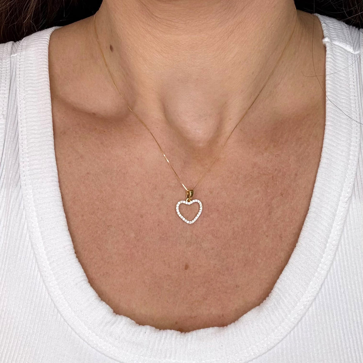 COLLANA CON PENDENTE CUORE E ZIRCONI IN ORO GIALLO 18 KT