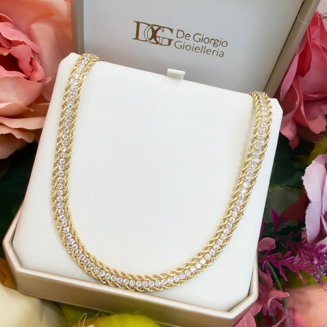 COLLANA TENNIS CON LAVORAZIONE INTRECCIATA IN ORO GIALLO 18 KT (750)