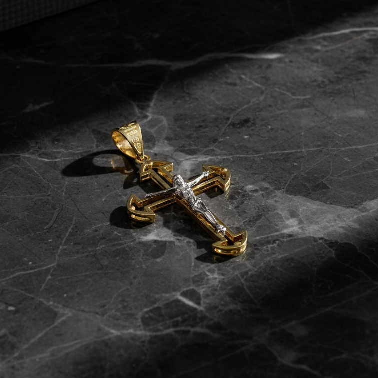 Ciondolo croce in oro giallo e bianco 18KT (750) con Cristo