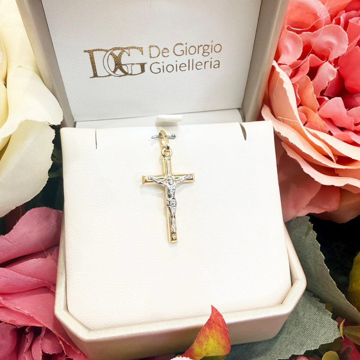 Ciondolo croce con Cristo da uomo in oro giallo e oro bianco 18 Kt (750)