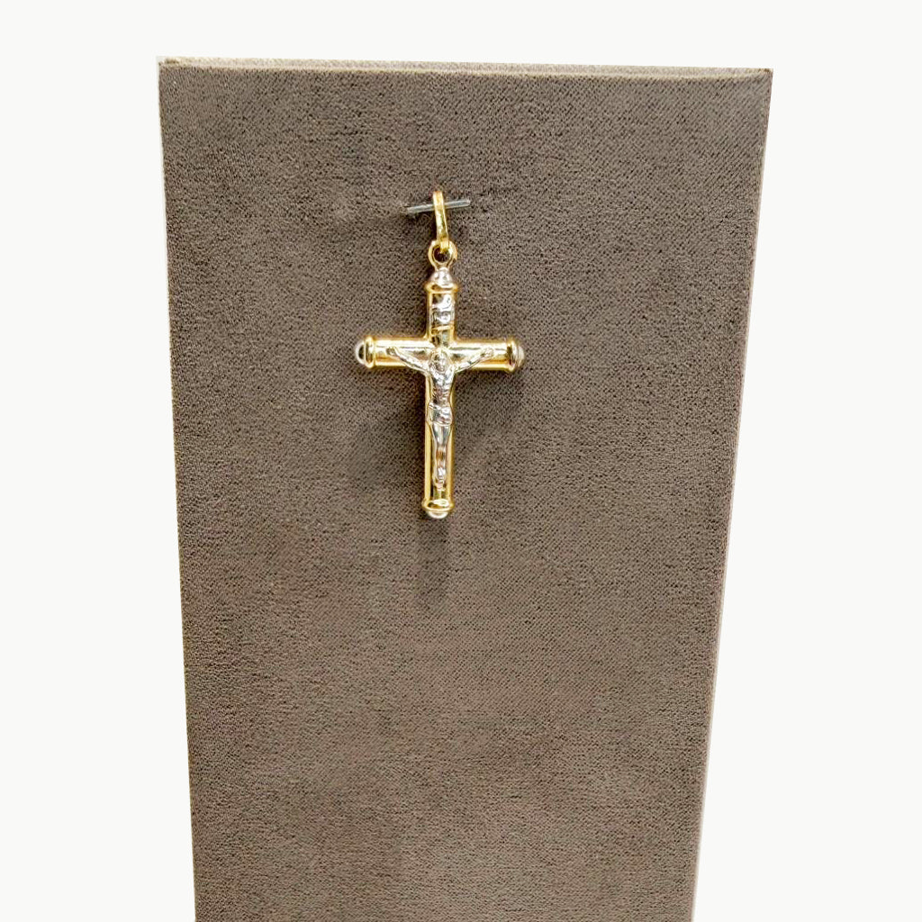 Ciondolo croce con Cristo da uomo in oro giallo e oro bianco 18 Kt (750)