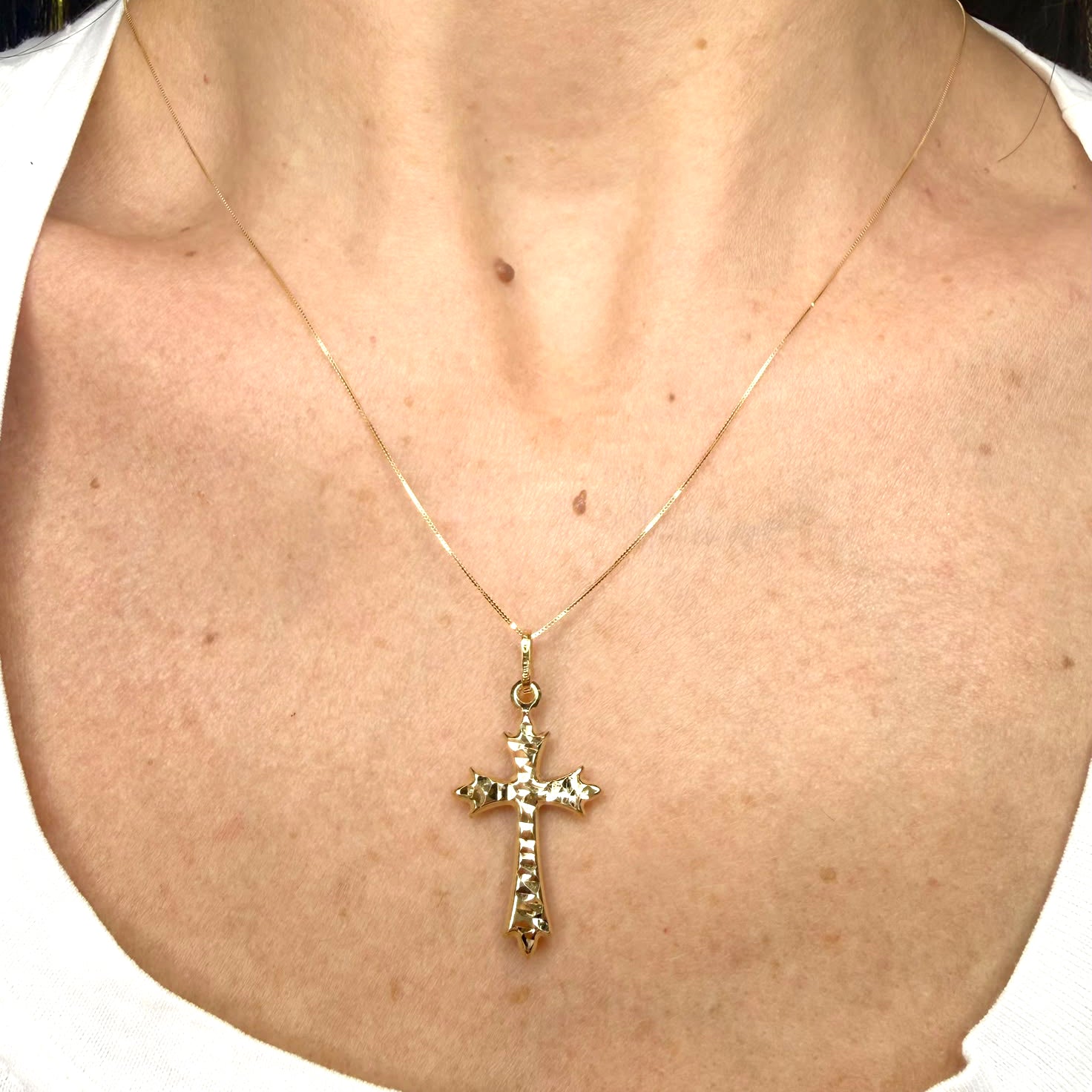 Croce sfaccettata in oro giallo 18 KT (750)
