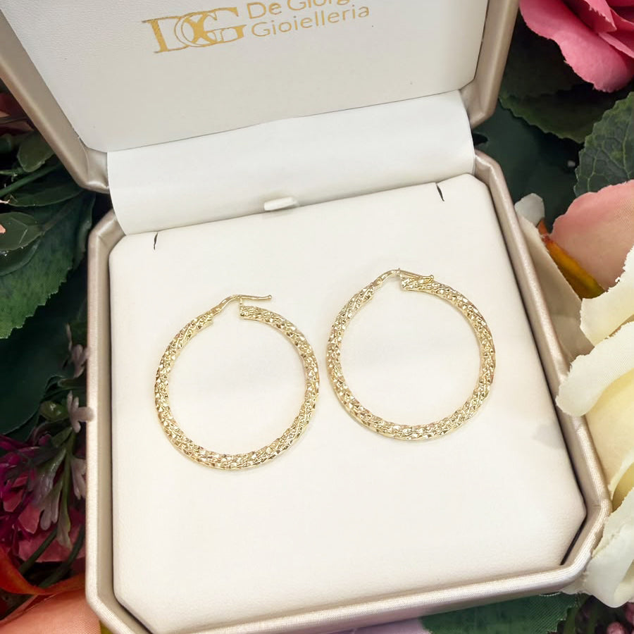 ORECCHINI A CERCHIO LAVORATI IN ORO 18 KT