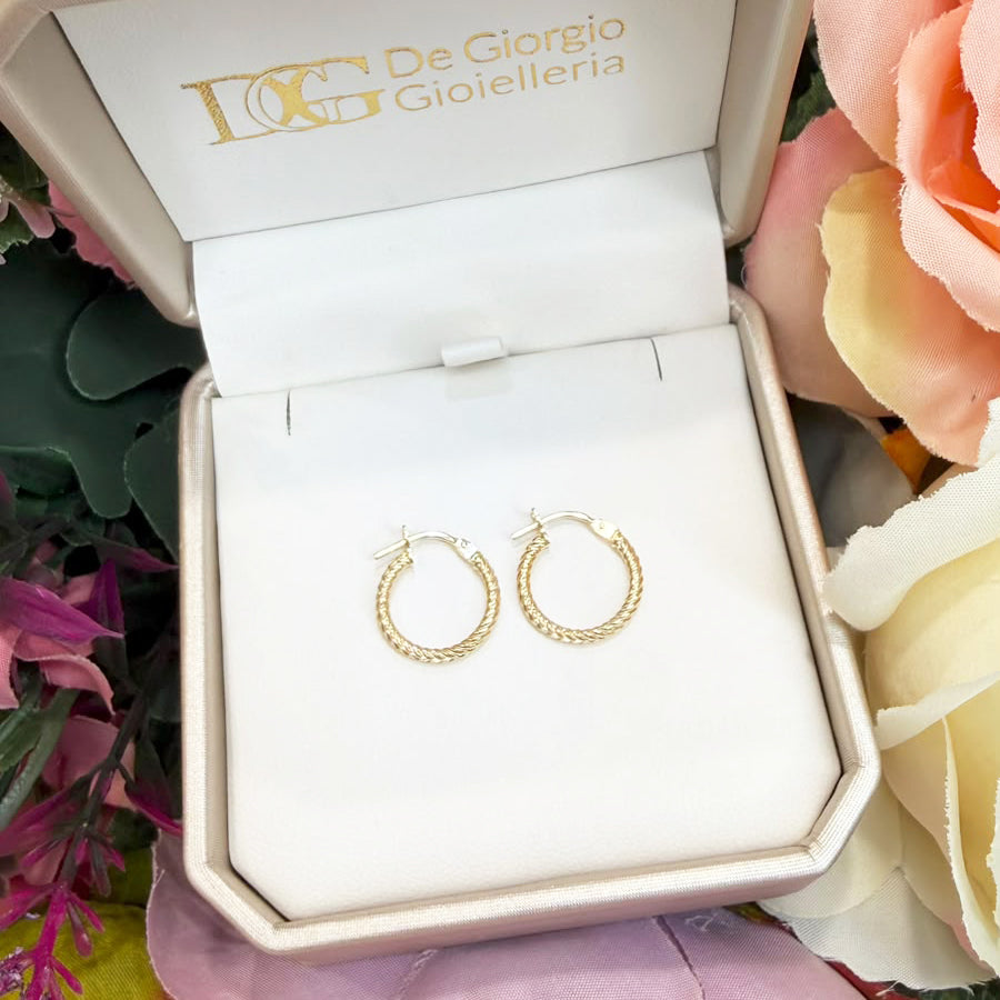 ORECCHINI A CERCHIO CON LAVORAZIONE TORCHON IN ORO 18 KT