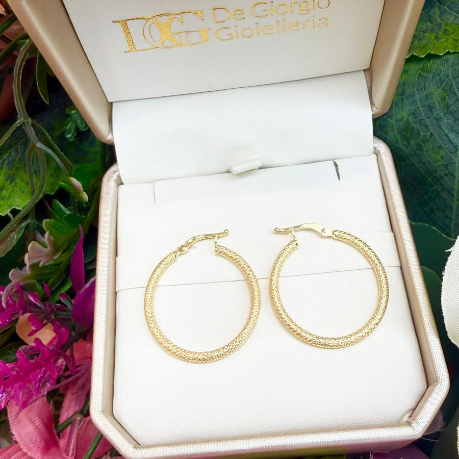 ORECCHINI A CERCHIO LAVORATI IN ORO GIALLO 18 KT (750)