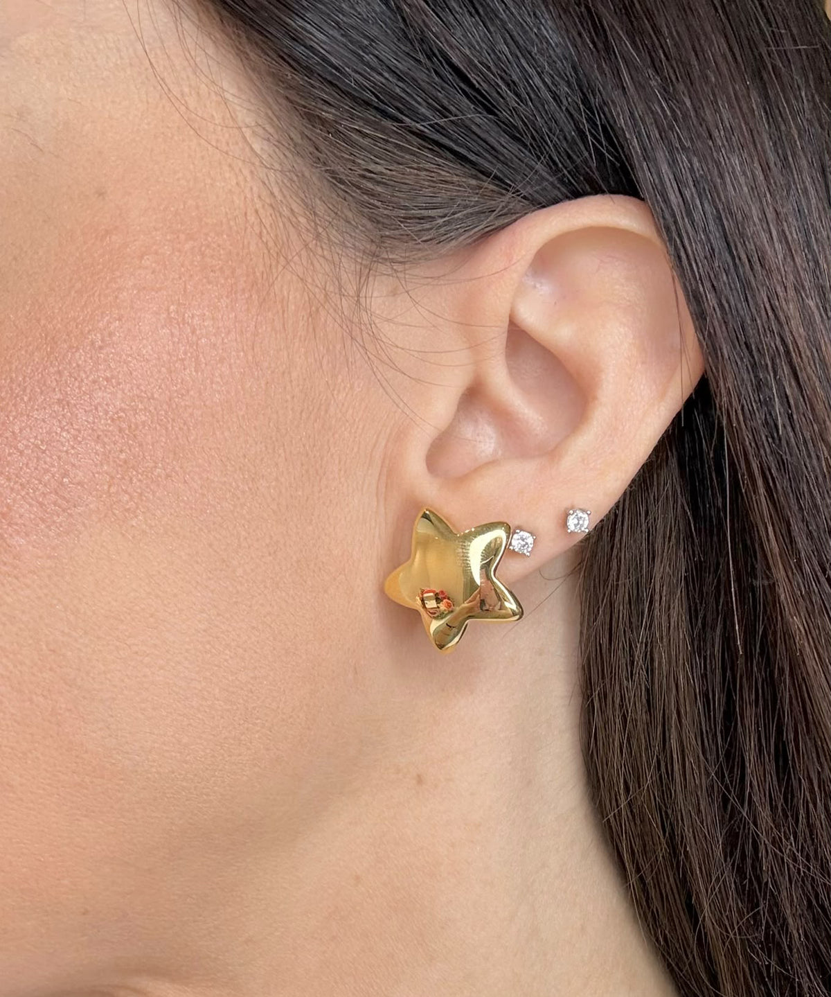 ORECCHINI A STELLA BOMBATA IN ORO GIALLO 18 KT (750)