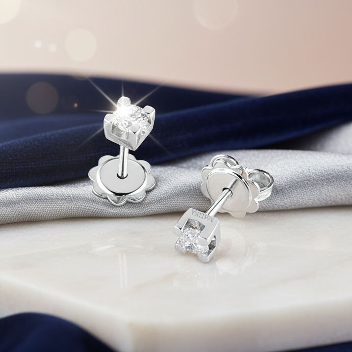 ORECCHINI PUNTO LUCE IN ORO BIANCO 18 CARATI E DIAMANTI